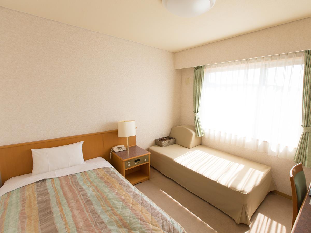 Hotel Laurel Shinhidaka Quarto foto