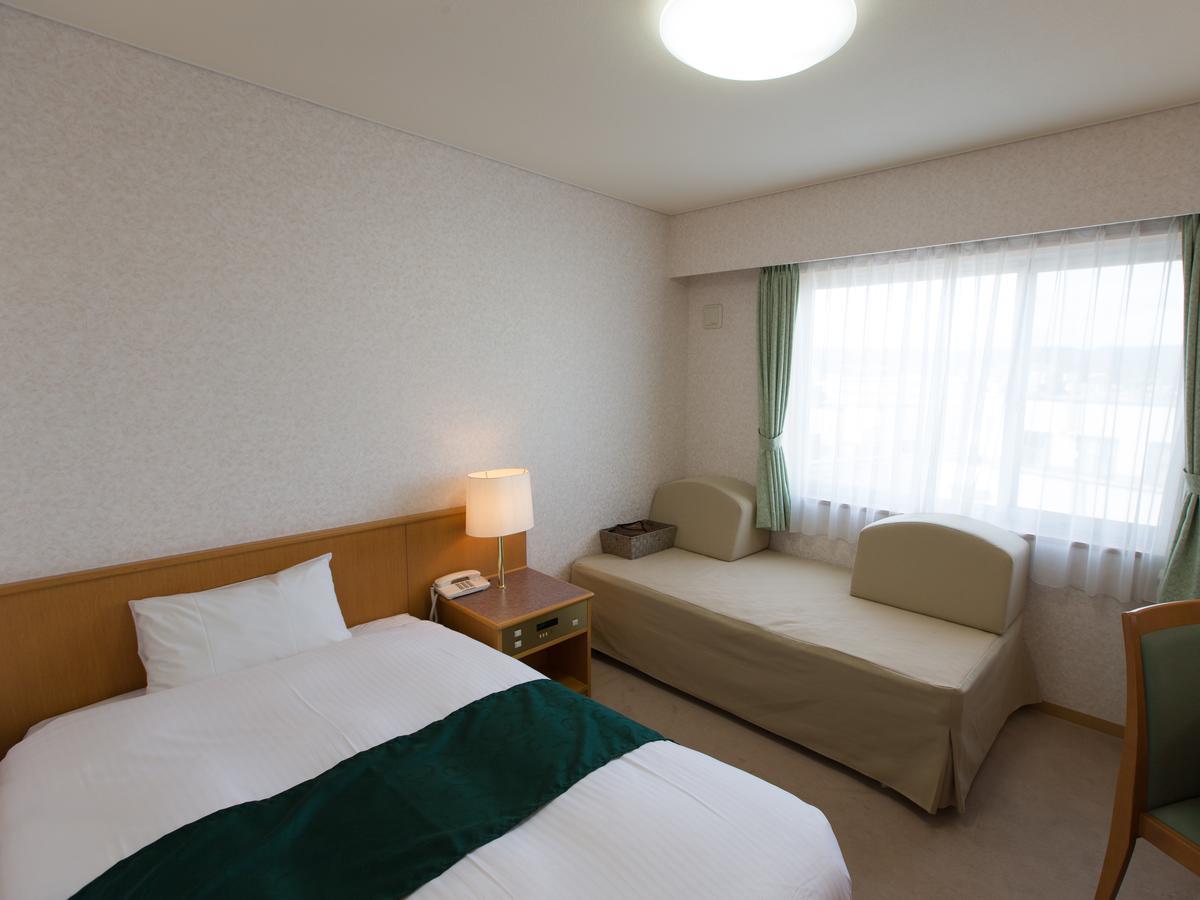 Hotel Laurel Shinhidaka Quarto foto